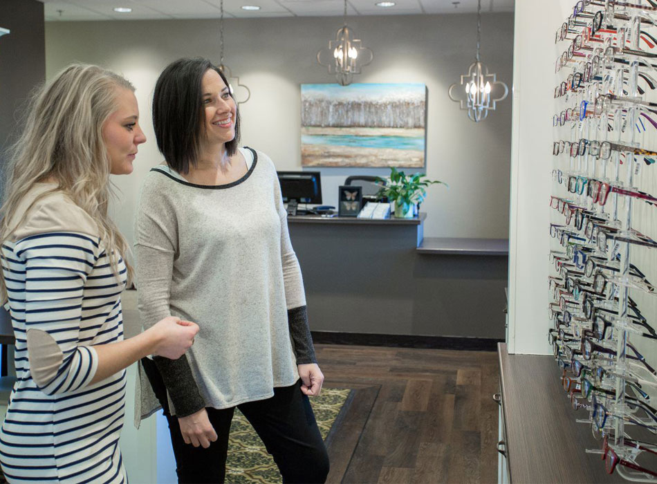 Adults looking at frame options at Rapid City Eye Care optical shop