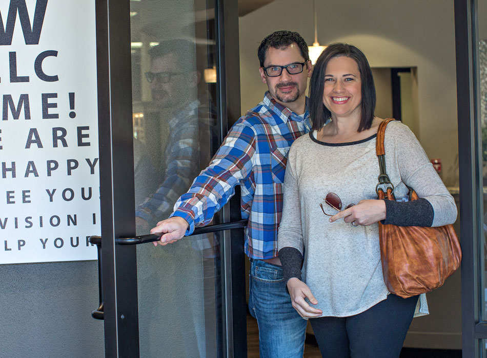 Couple leaving with glasses