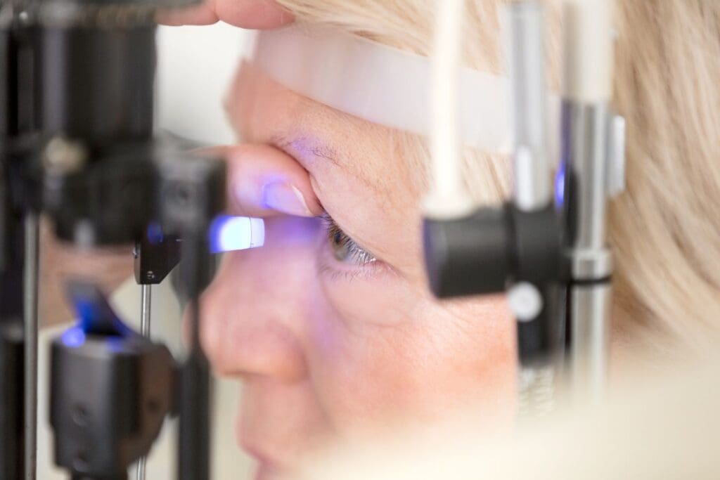 Older woman being checked for glaucoma