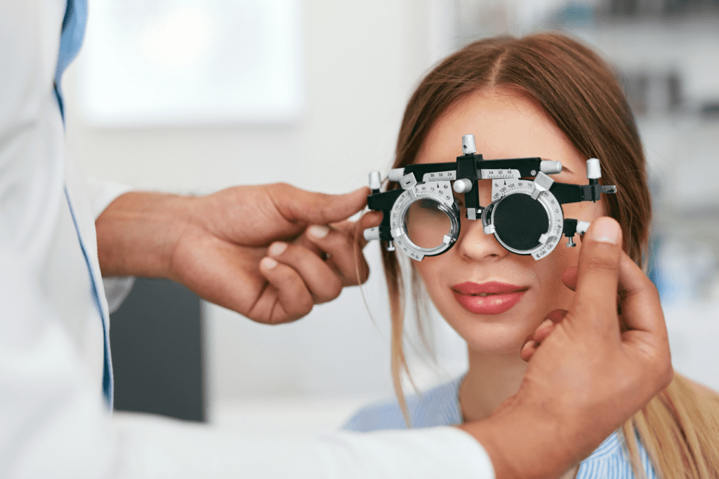 Young woman getting her eyes examined for a surgical evaluation